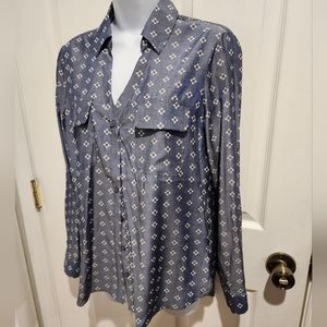 EXPRESS bottom down.  60% polyester 40% viscose. Feels silky and very soft.